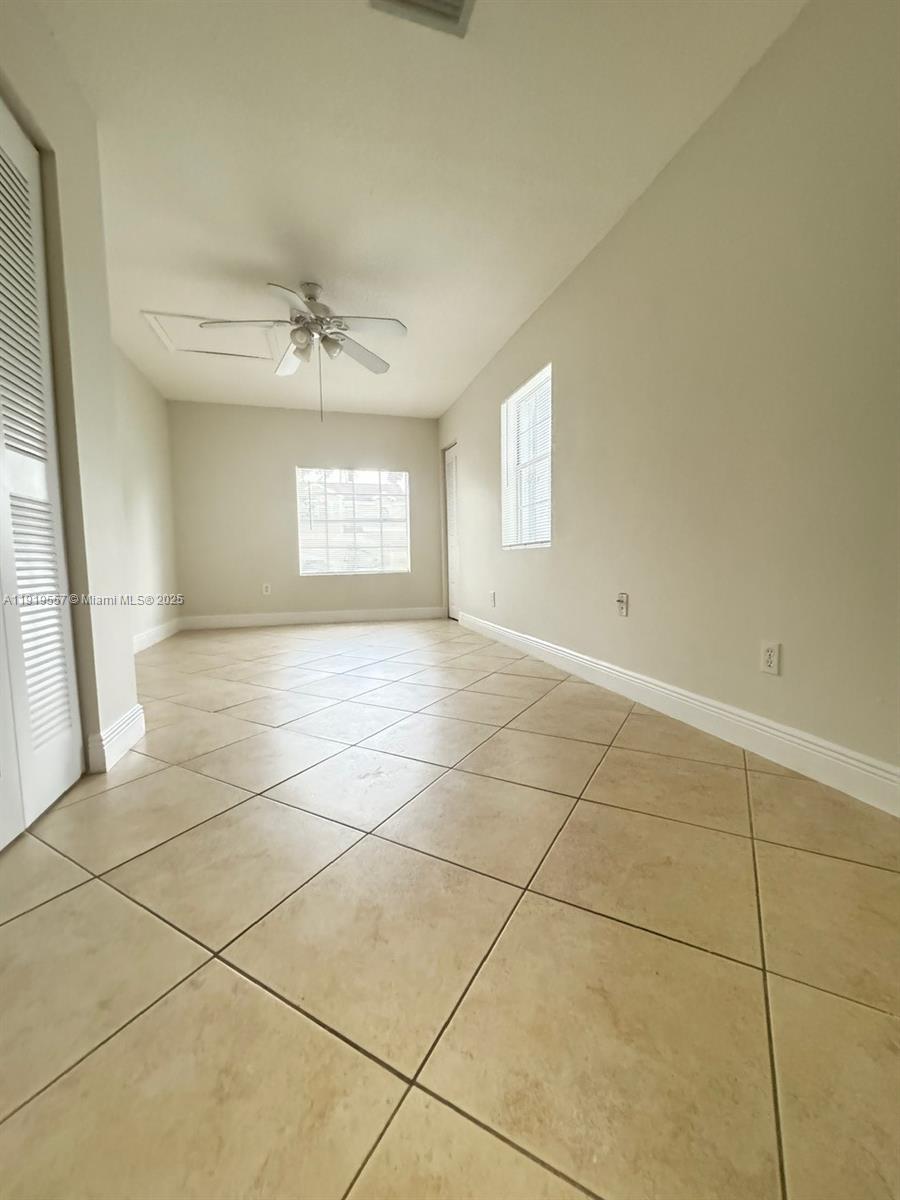 12833 Southwest 146th Terrace Miami, FL 33186 - Photo 28 of 29 a view of an empty room with a window