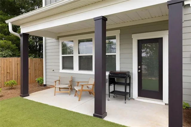 a house view with outdoor seating space