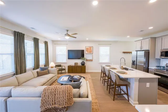 a bedroom with a bed and a couch