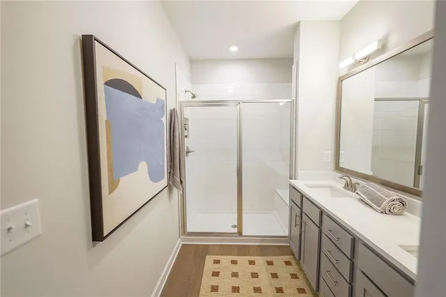 a bathroom with a double vanity sink mirror and double