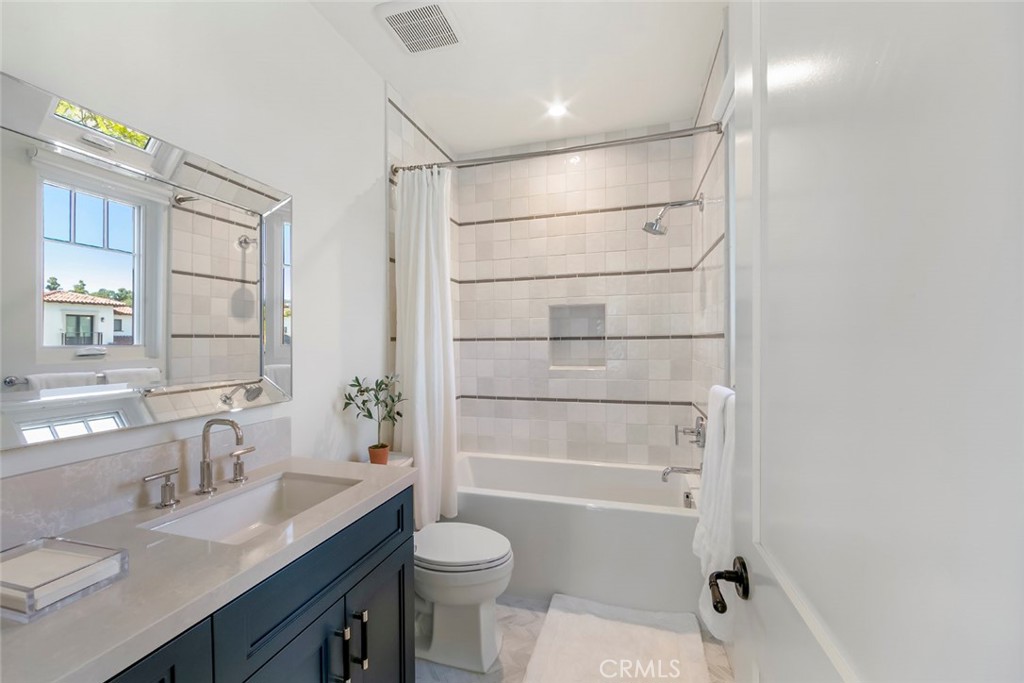 5 Rancho Elastico Road Rolling Hills Estates, CA 90274 - Photo 37 of 48 a bathroom with a sink a toilet and shower