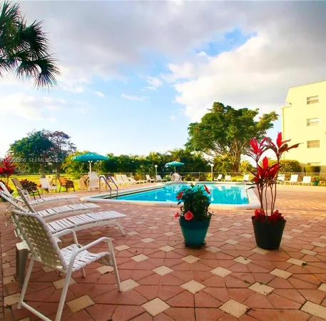 $1,390 | 1035 Country Club Drive, Unit 104, Pompano Beach, FL 33063