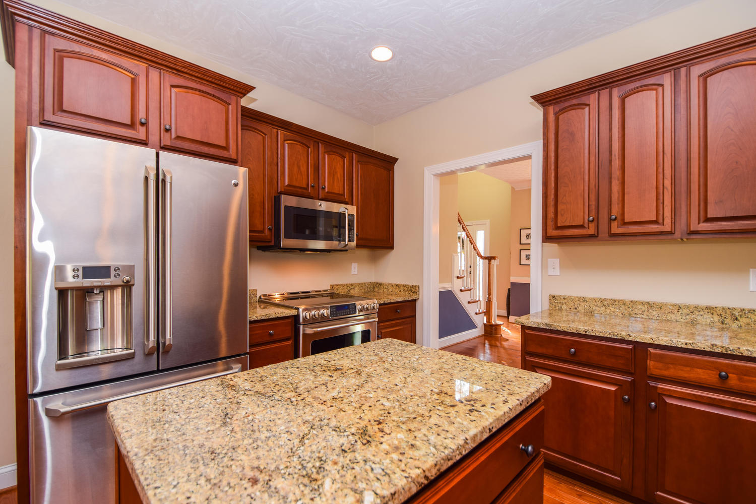 45 Turtle Rock Ridge Blue Ridge, VA 24064 - Photo 21 of 55 a kitchen with stainless steel appliances granite countertop refrigerator stove microwave and sink