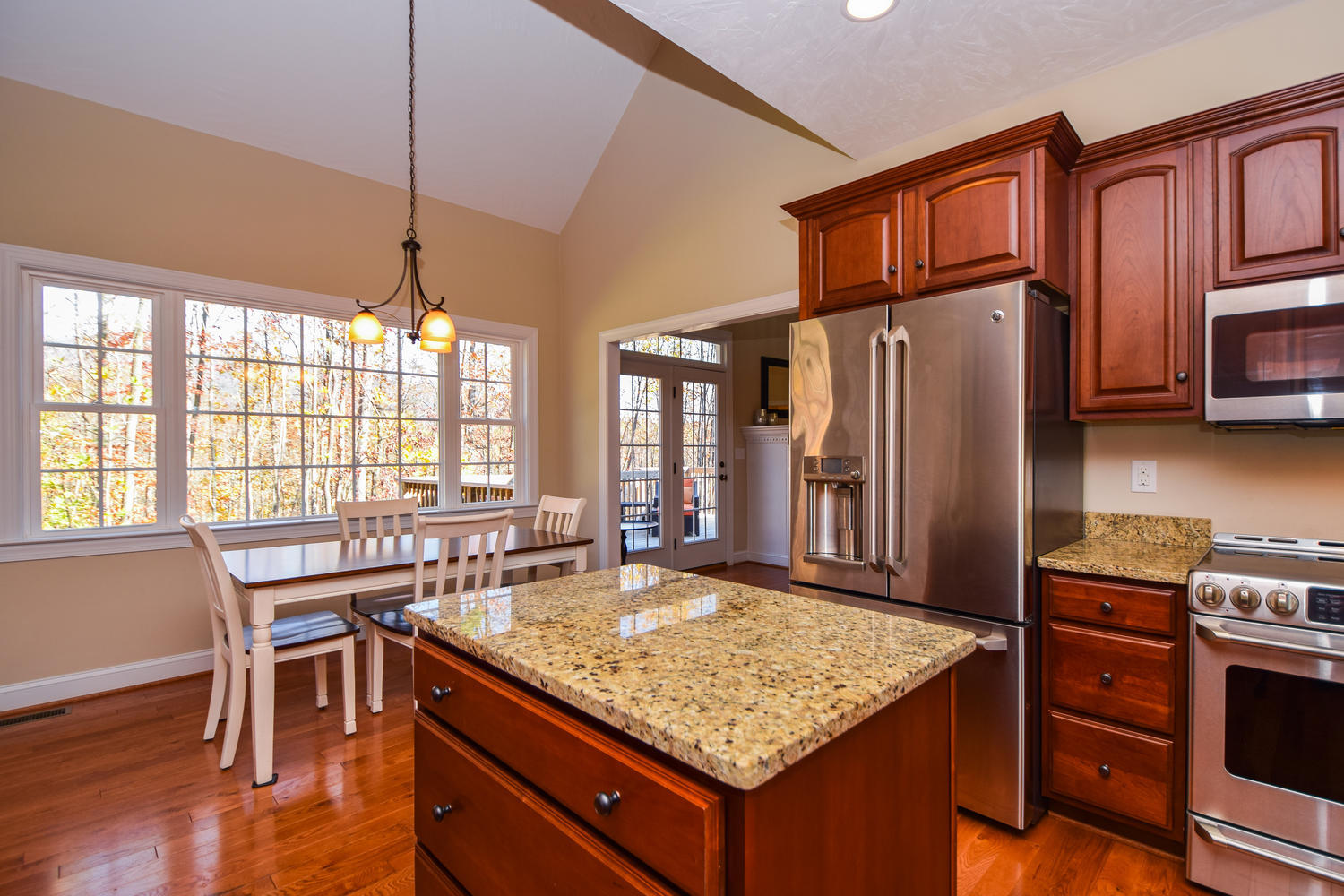45 Turtle Rock Ridge Blue Ridge, VA 24064 - Photo 22 of 55 a kitchen with stainless steel appliances granite countertop a stove and a refrigerator