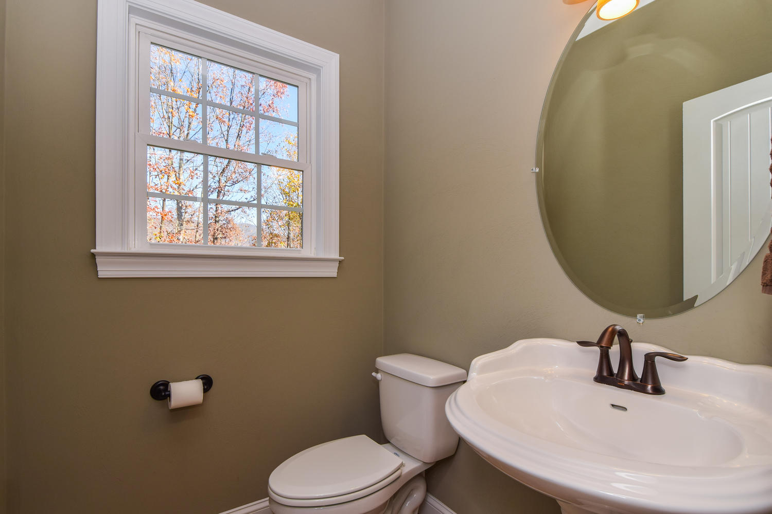 45 Turtle Rock Ridge Blue Ridge, VA 24064 - Photo 23 of 55 a bathroom with a sink mirror and toilet