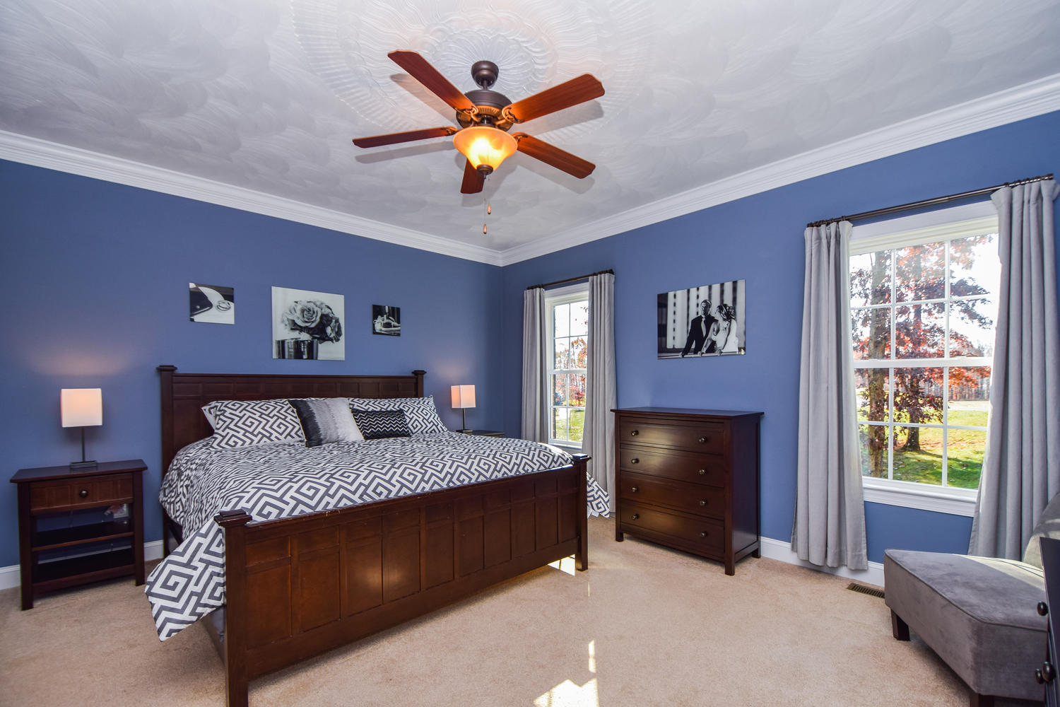 45 Turtle Rock Ridge Blue Ridge, VA 24064 - Photo 24 of 55 a bedroom with a bed and a ceiling fan