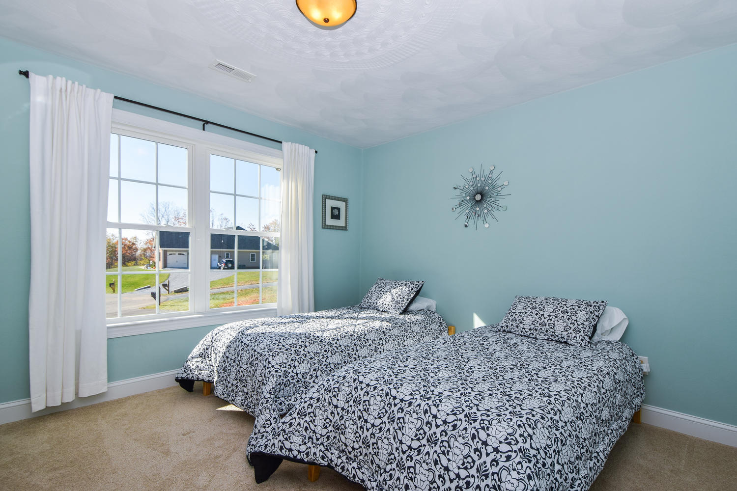 45 Turtle Rock Ridge Blue Ridge, VA 24064 - Photo 31 of 55 a living room with a bed furniture and next to a window