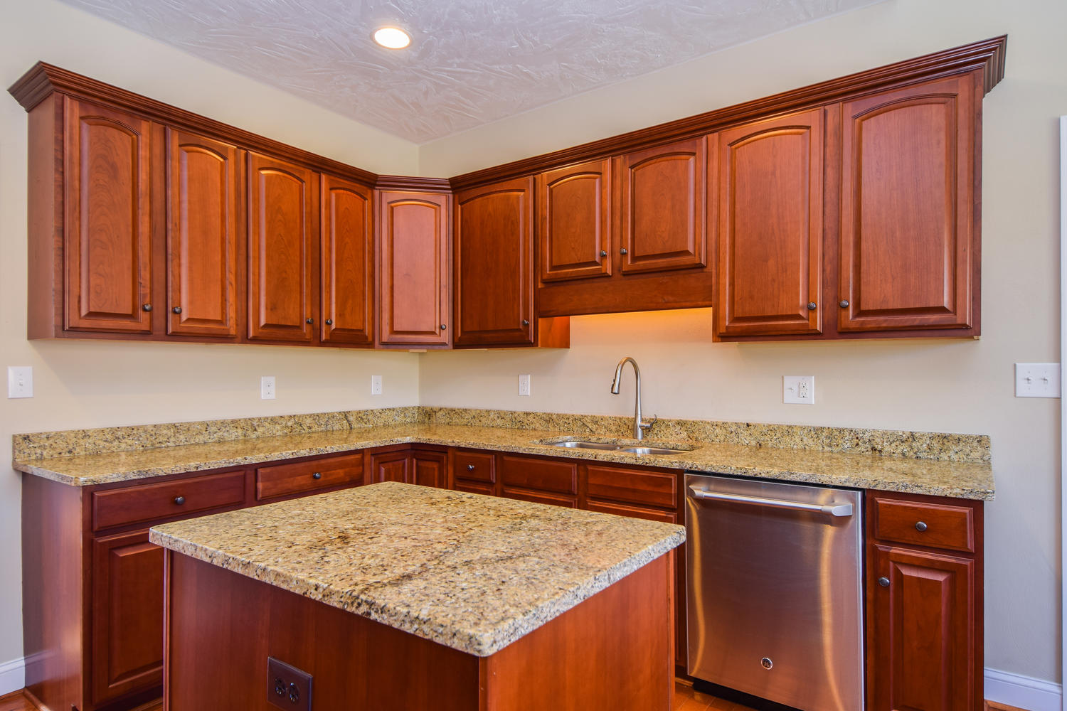 45 Turtle Rock Ridge Blue Ridge, VA 24064 - Photo 41 of 55 a kitchen with stainless steel appliances granite countertop wooden cabinets a sink and dishwasher