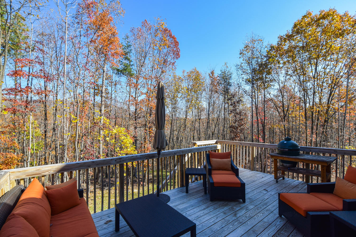 45 Turtle Rock Ridge Blue Ridge, VA 24064 - Photo 46 of 55 a roof deck with couches and wooden floor