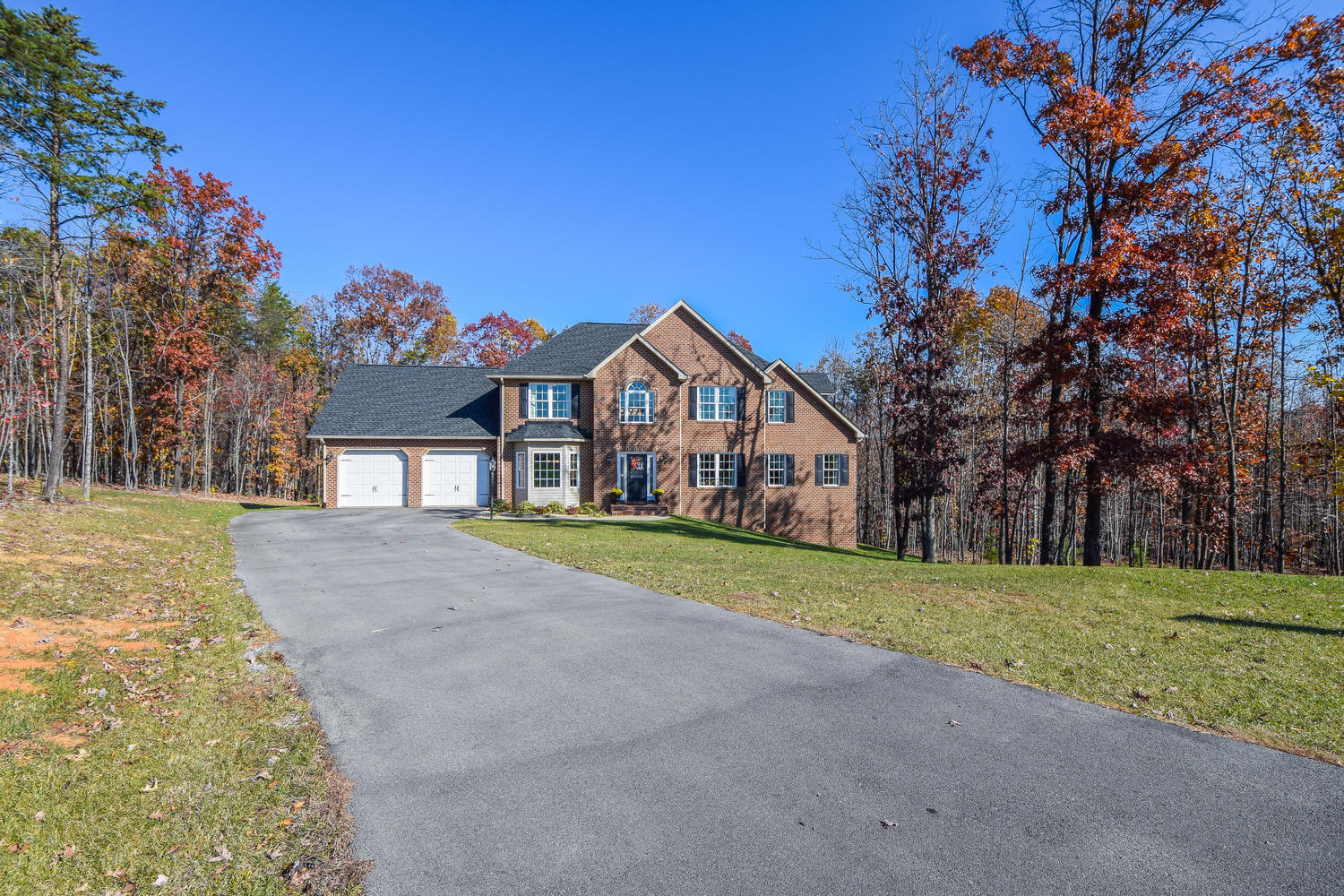 45 Turtle Rock Ridge Blue Ridge, VA 24064 - Photo 48 of 55 a front view of a house with a yard and garage