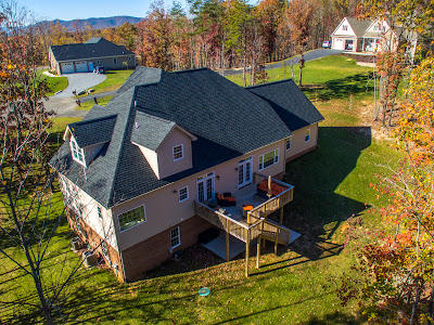 45 Turtle Rock Ridge Blue Ridge, VA 24064 - Photo 5 of 55 an aerial view of a house with swimming pool and large trees