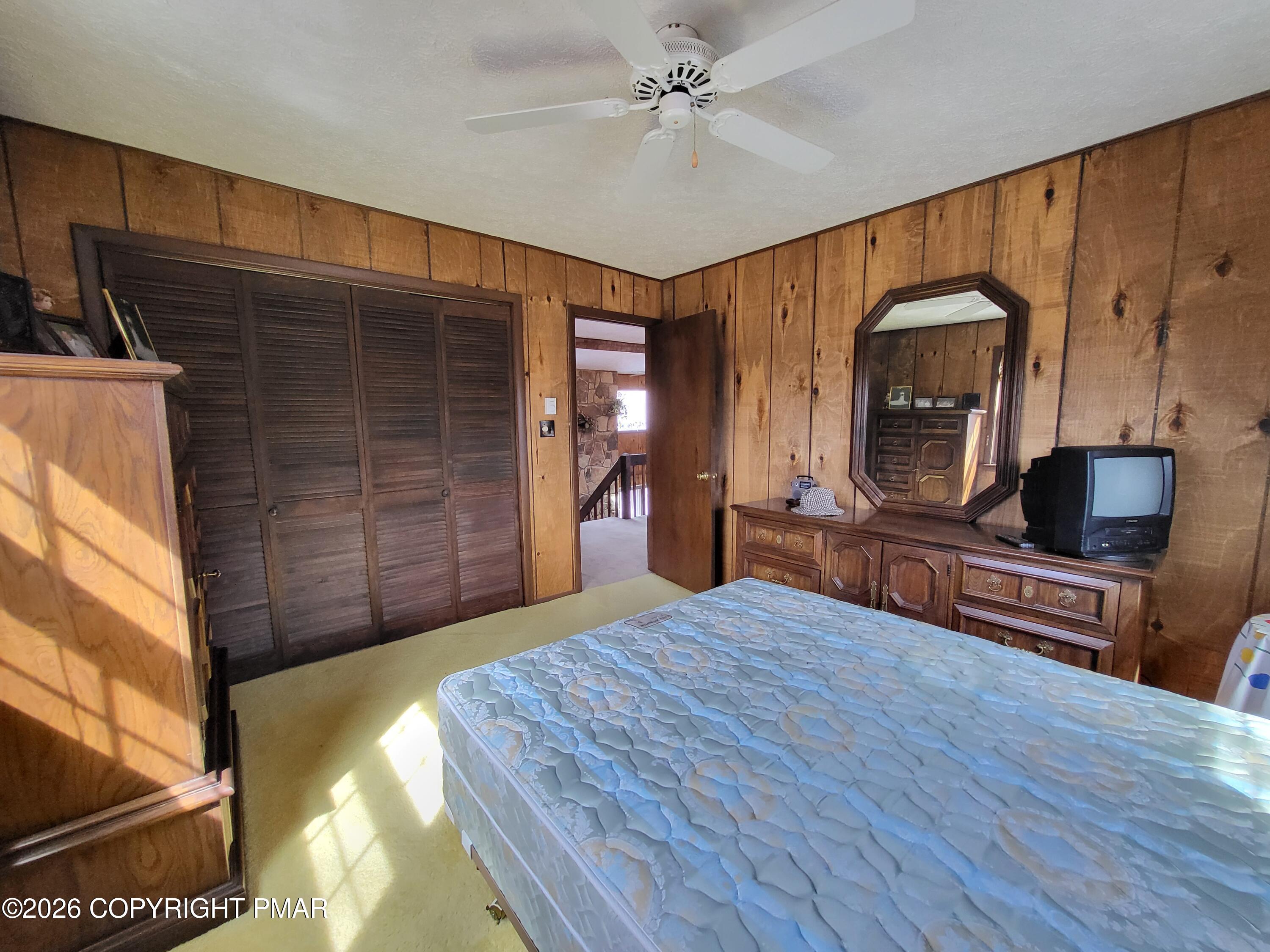 2014 Scarborough Way Bushkill, PA 18324 - Photo 12 of 82 a bedroom with a bed and a flat screen tv