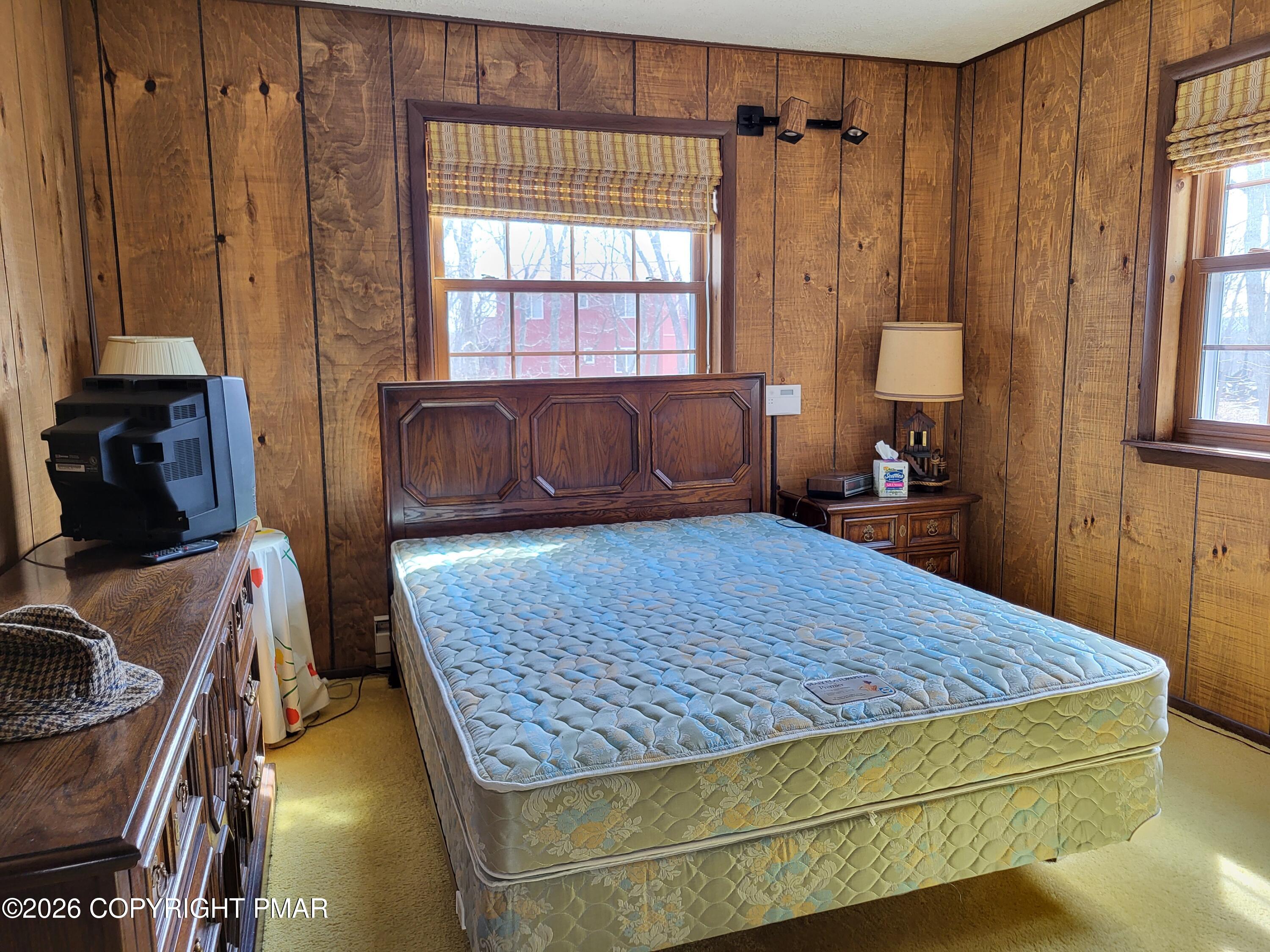 2014 Scarborough Way Bushkill, PA 18324 - Photo 14 of 82 a bedroom with a bed and wooden floor