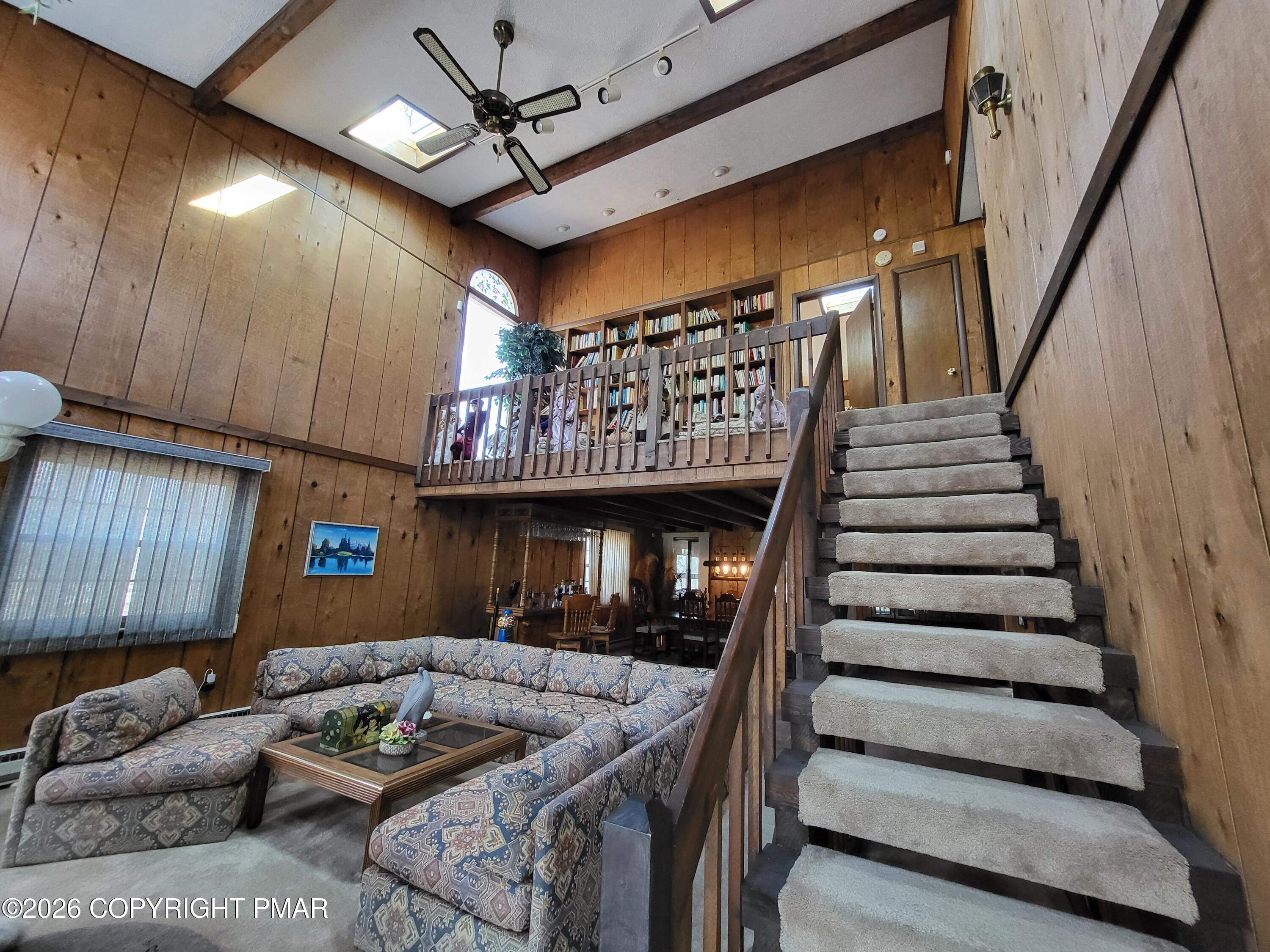 2014 Scarborough Way Bushkill, PA 18324 - Photo 16 of 82 a living room with furniture and a wooden floor