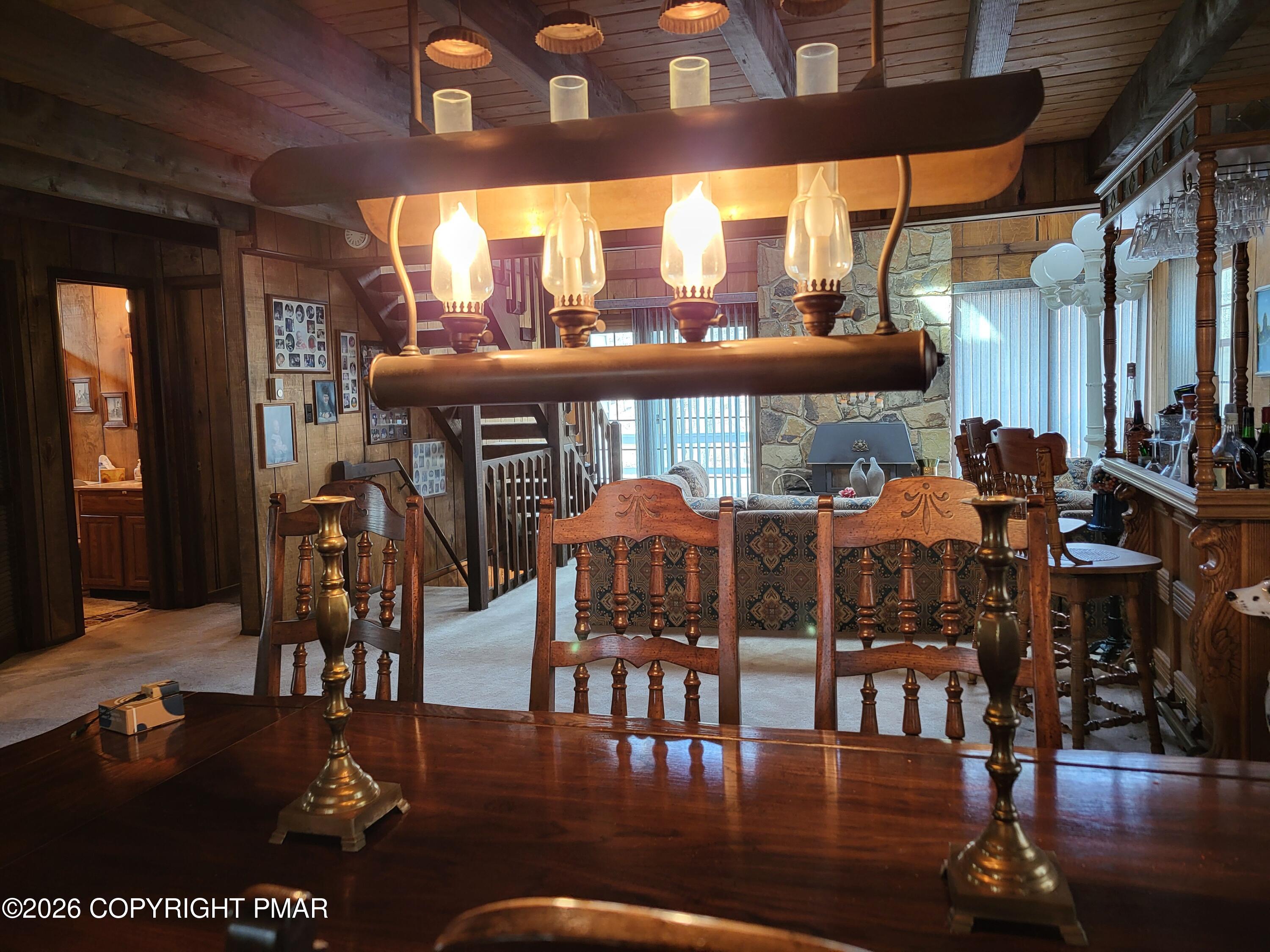 2014 Scarborough Way Bushkill, PA 18324 - Photo 24 of 82 a view of a dining room with furniture window and wooden floor