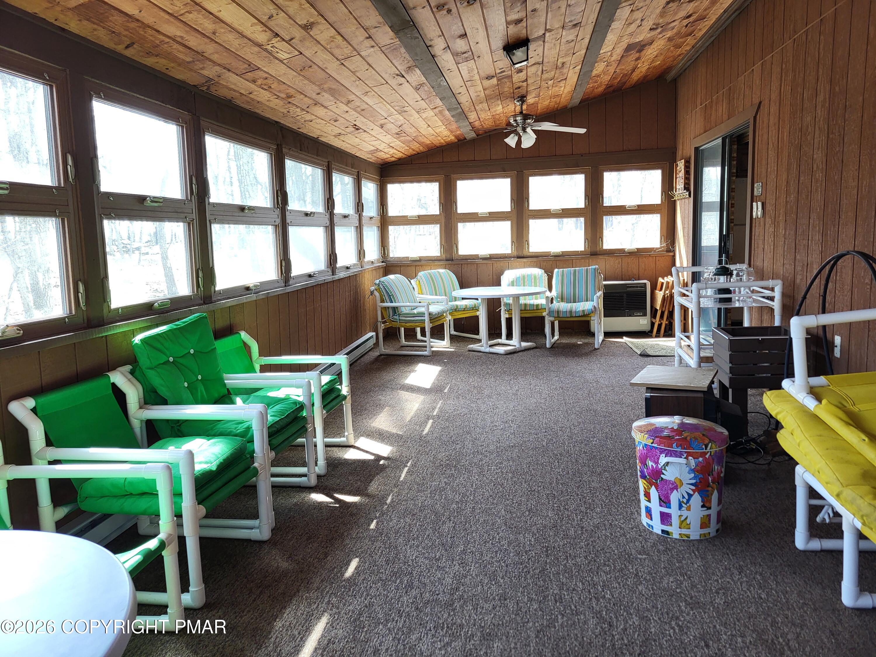 2014 Scarborough Way Bushkill, PA 18324 - Photo 31 of 82 a living room with furniture and a large window
