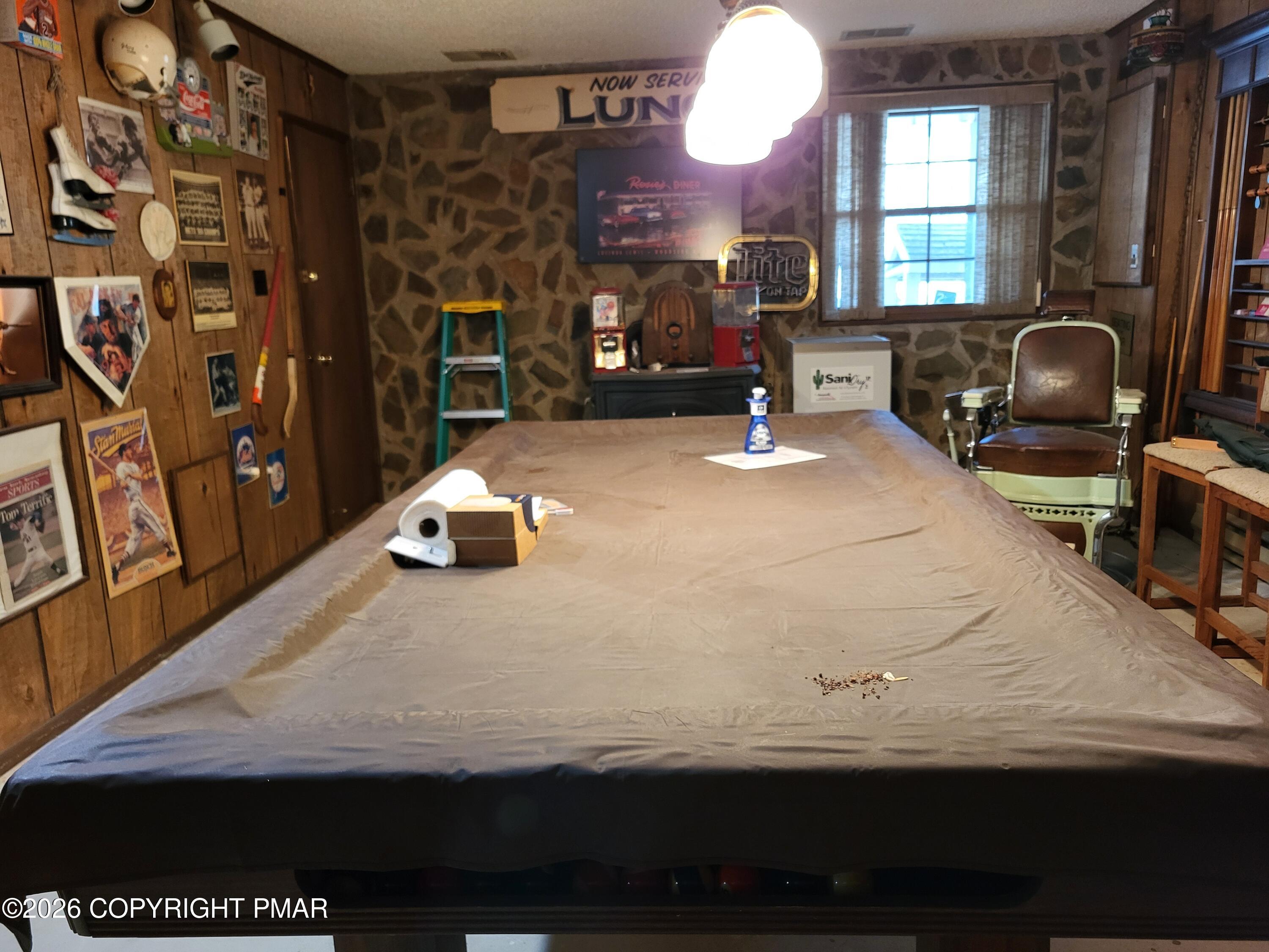 2014 Scarborough Way Bushkill, PA 18324 - Photo 39 of 82 a room with wooden floor and furniture