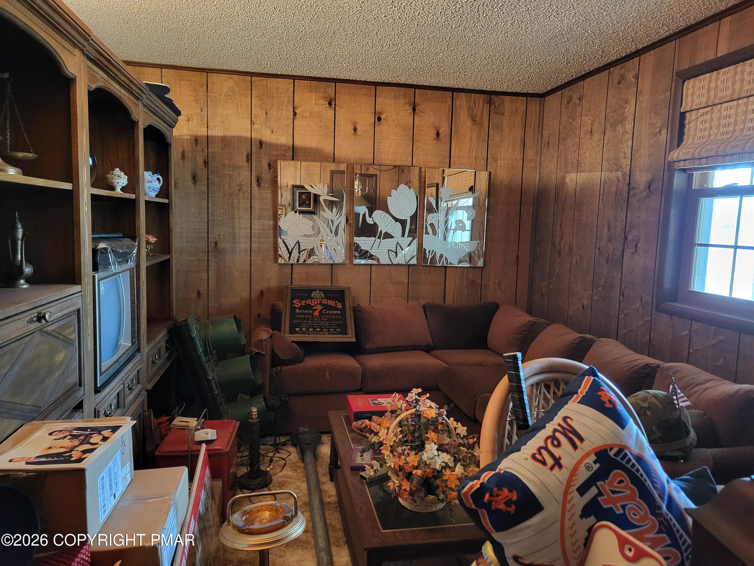 2014 Scarborough Way Bushkill, PA 18324 - Photo 40 of 82 a living room with furniture and a window