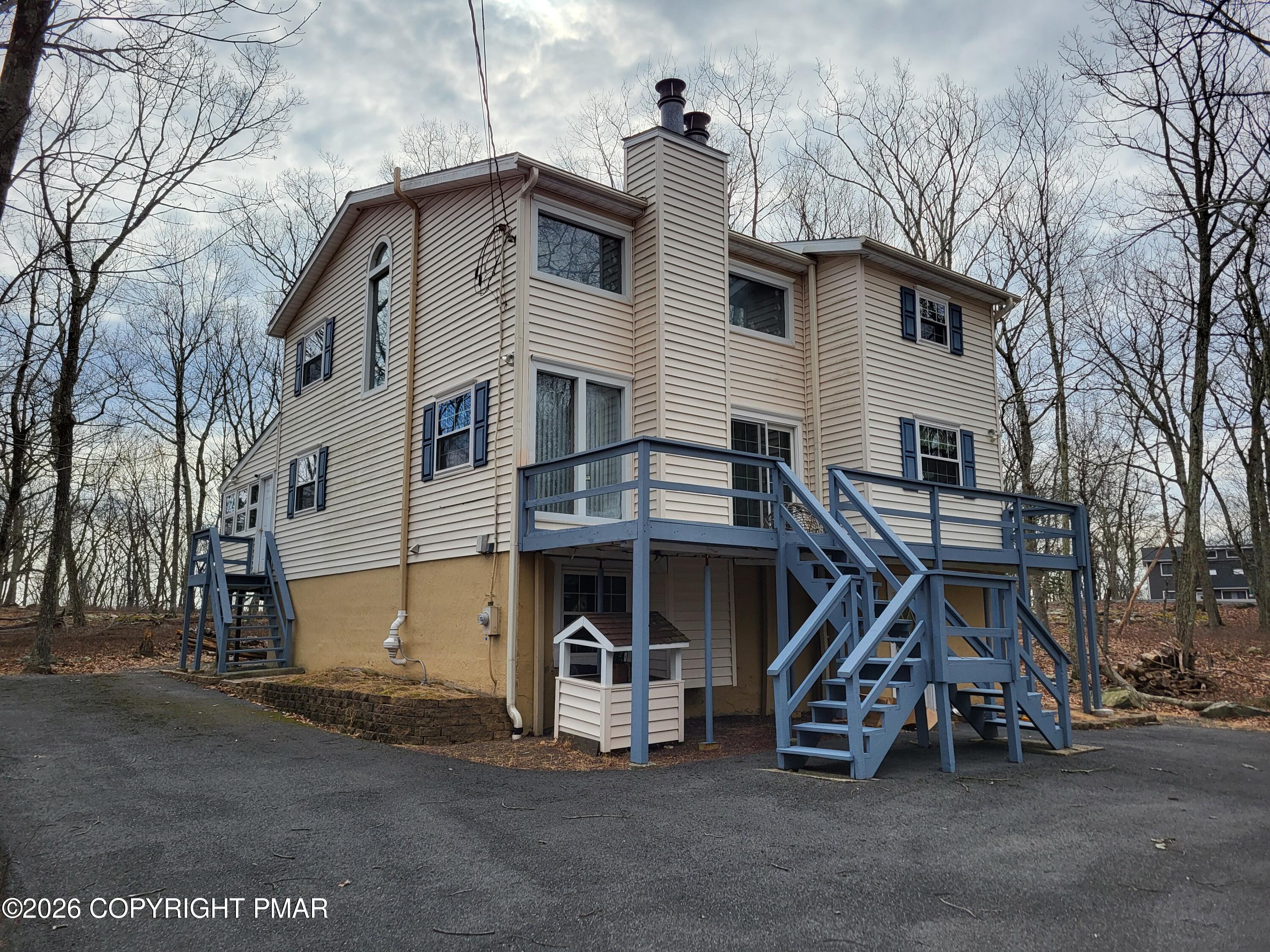 2014 Scarborough Way Bushkill, PA 18324 - Photo 49 of 82 a view of a house with a yard and balcony