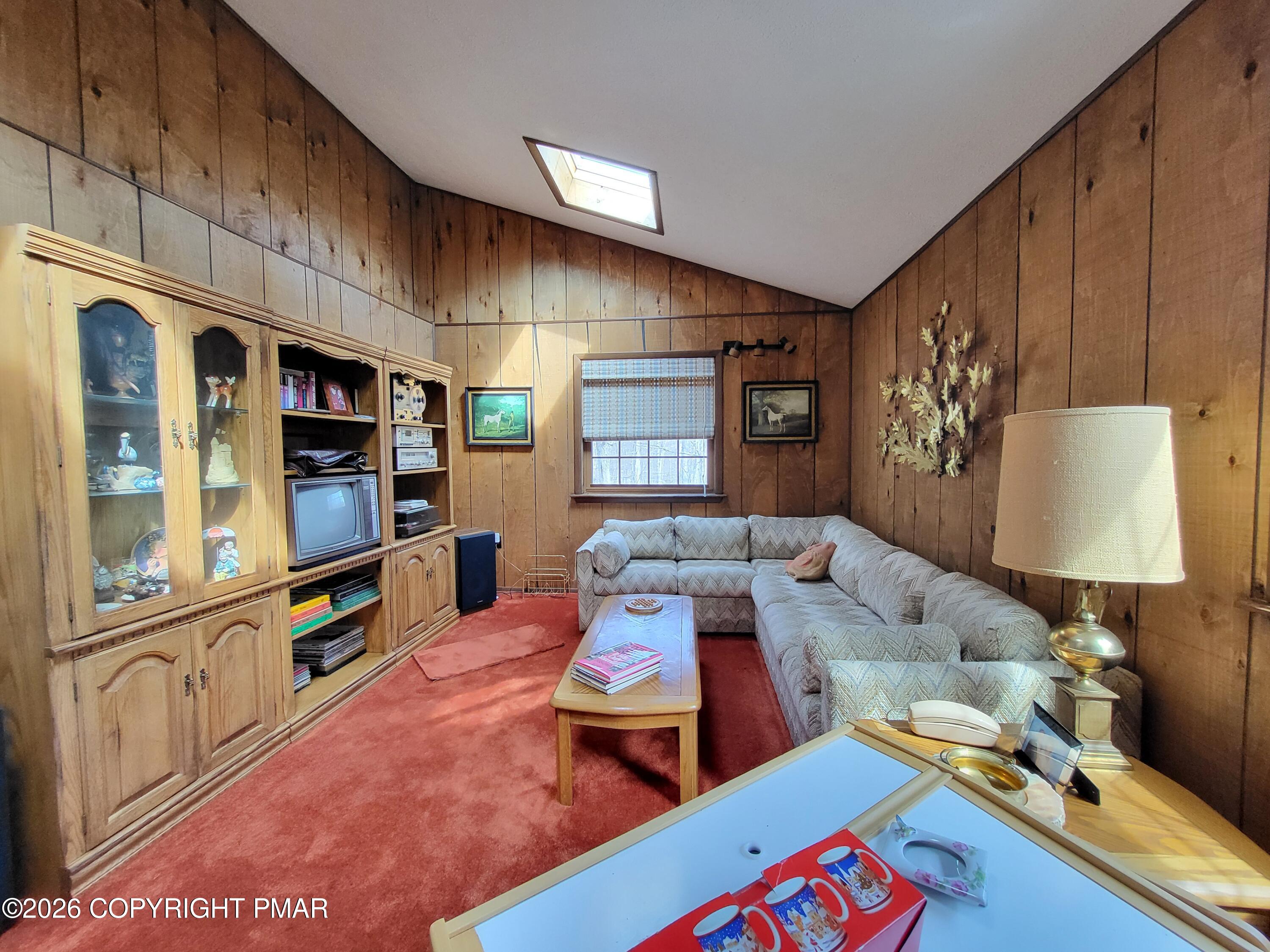 2014 Scarborough Way Bushkill, PA 18324 - Photo 8 of 82 a living room with furniture and a flat screen tv