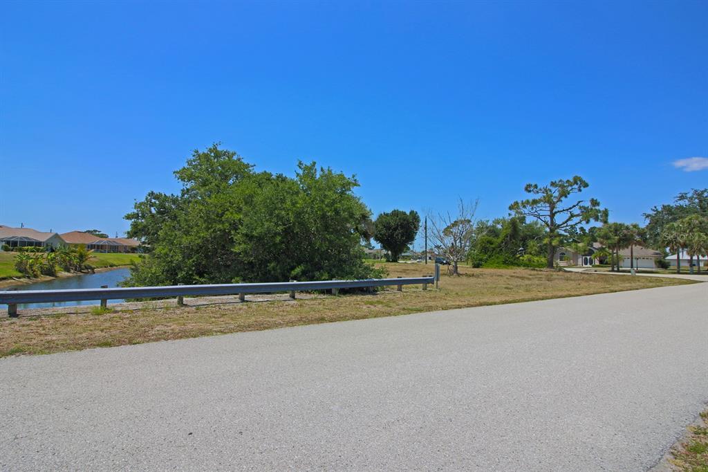 133 Fairway Road Rotonda West, FL 33947 - Photo 11 of 16 a view of a swimming pool and an outdoor space