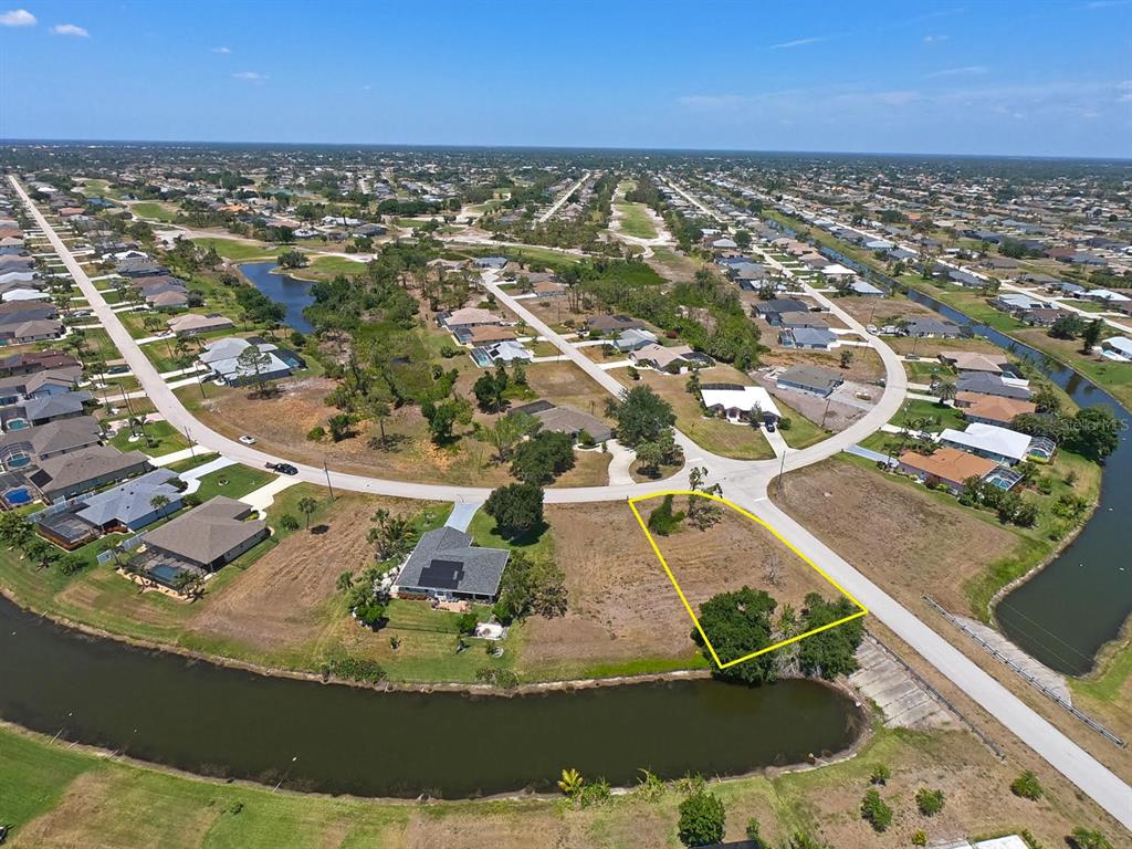 133 Fairway Road Rotonda West, FL 33947 - Photo 2 of 16 an aerial view of residential houses with outdoor space