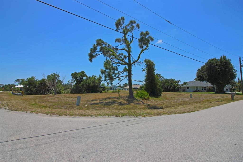 133 Fairway Road Rotonda West, FL 33947 - Photo 6 of 16 a view of a yard