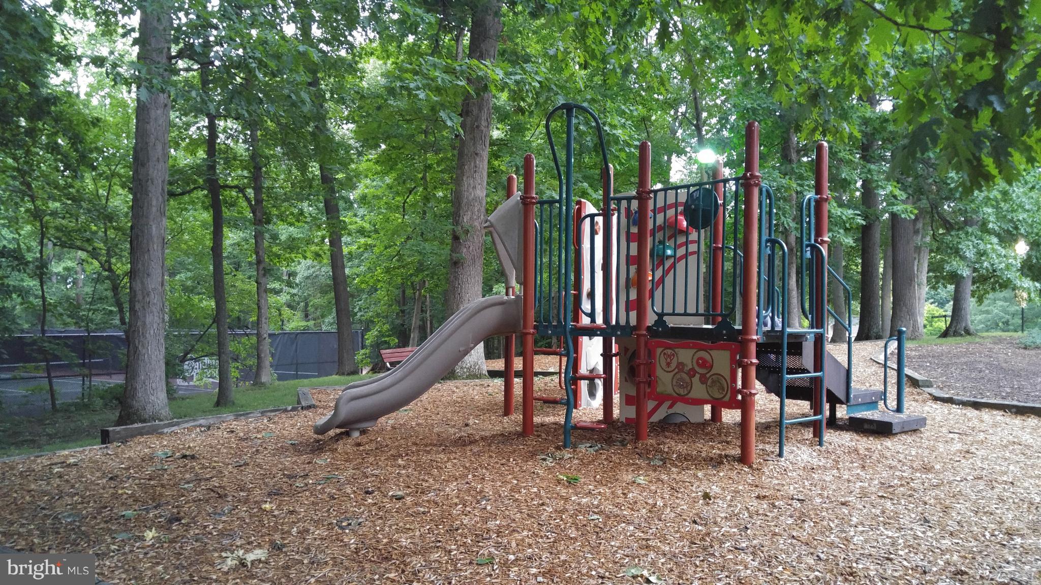 8114 Colony Point Road, Unit 239 Springfield, VA 22152 - Photo 5 of 12 community playground, tennis courts, dog walk area