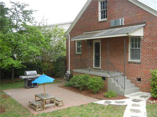 Brick Patio - Plenty of room for entertaining. Door leads directly from kitchen so entertaining outside is very convenient. Patio/Deck