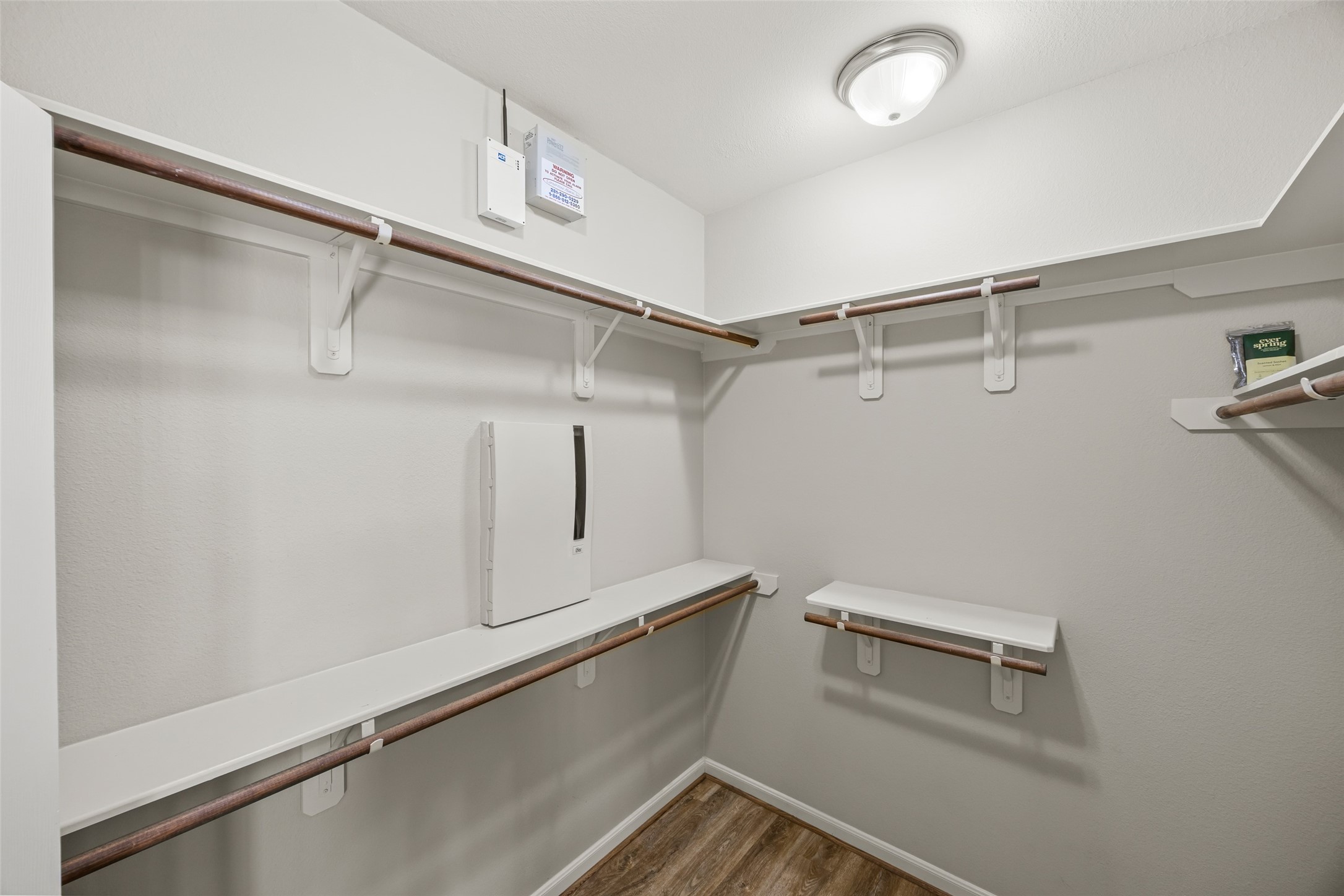 12322 West Elizabeth Shore Loop Cypress, TX 77433 - Photo 15 of 28 a view of a room with racks on the wall