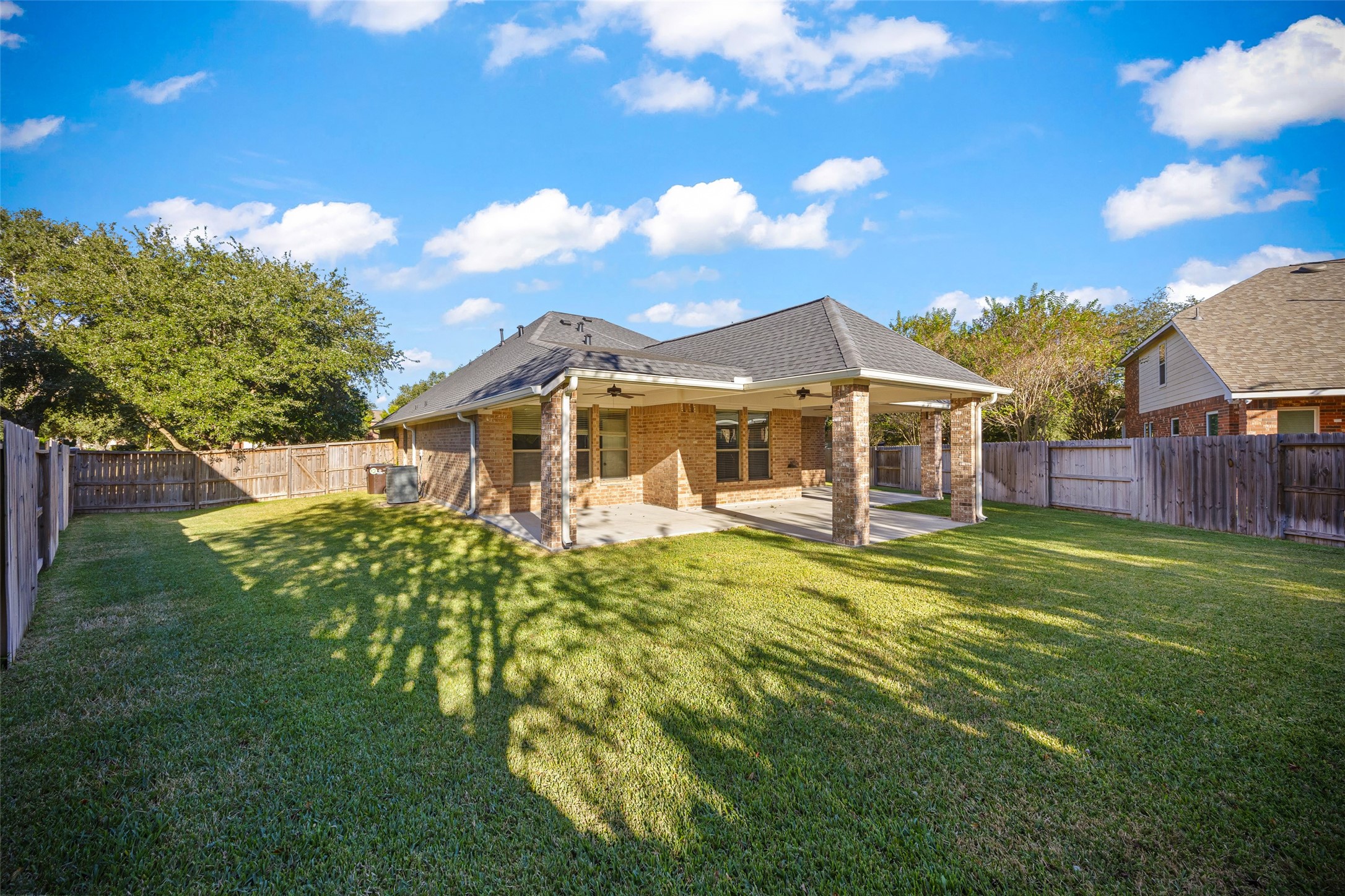 12322 West Elizabeth Shore Loop Cypress, TX 77433 - Photo 2 of 28 a front view of a house with a garden