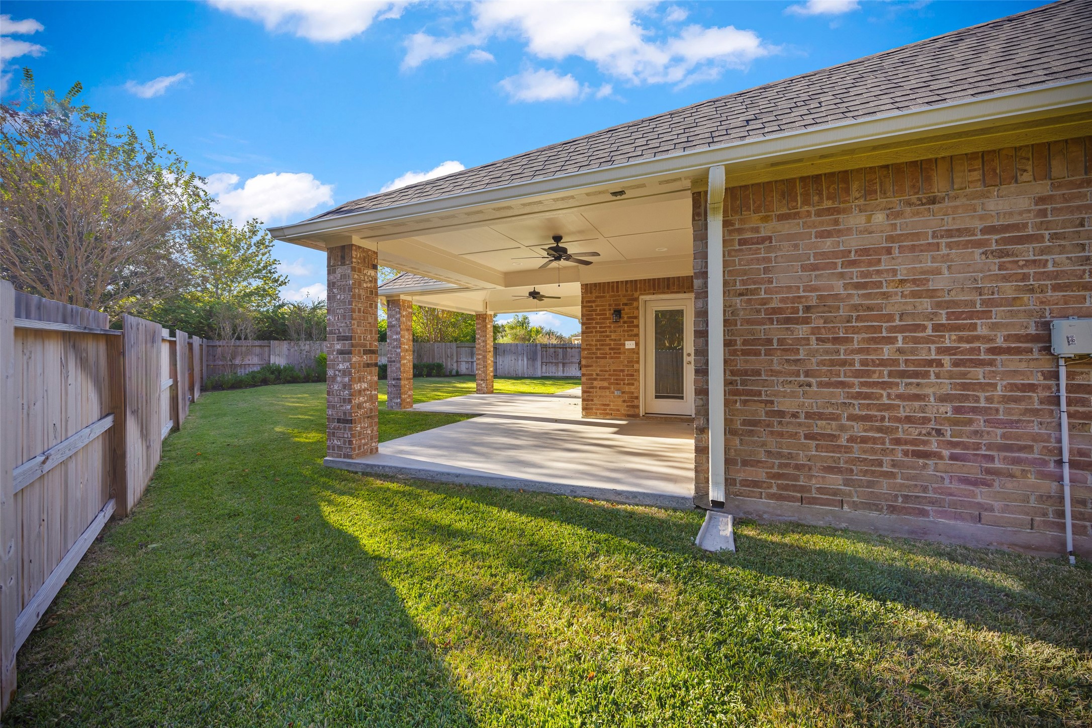 12322 West Elizabeth Shore Loop Cypress, TX 77433 - Photo 23 of 28 a view of a back yard of the house