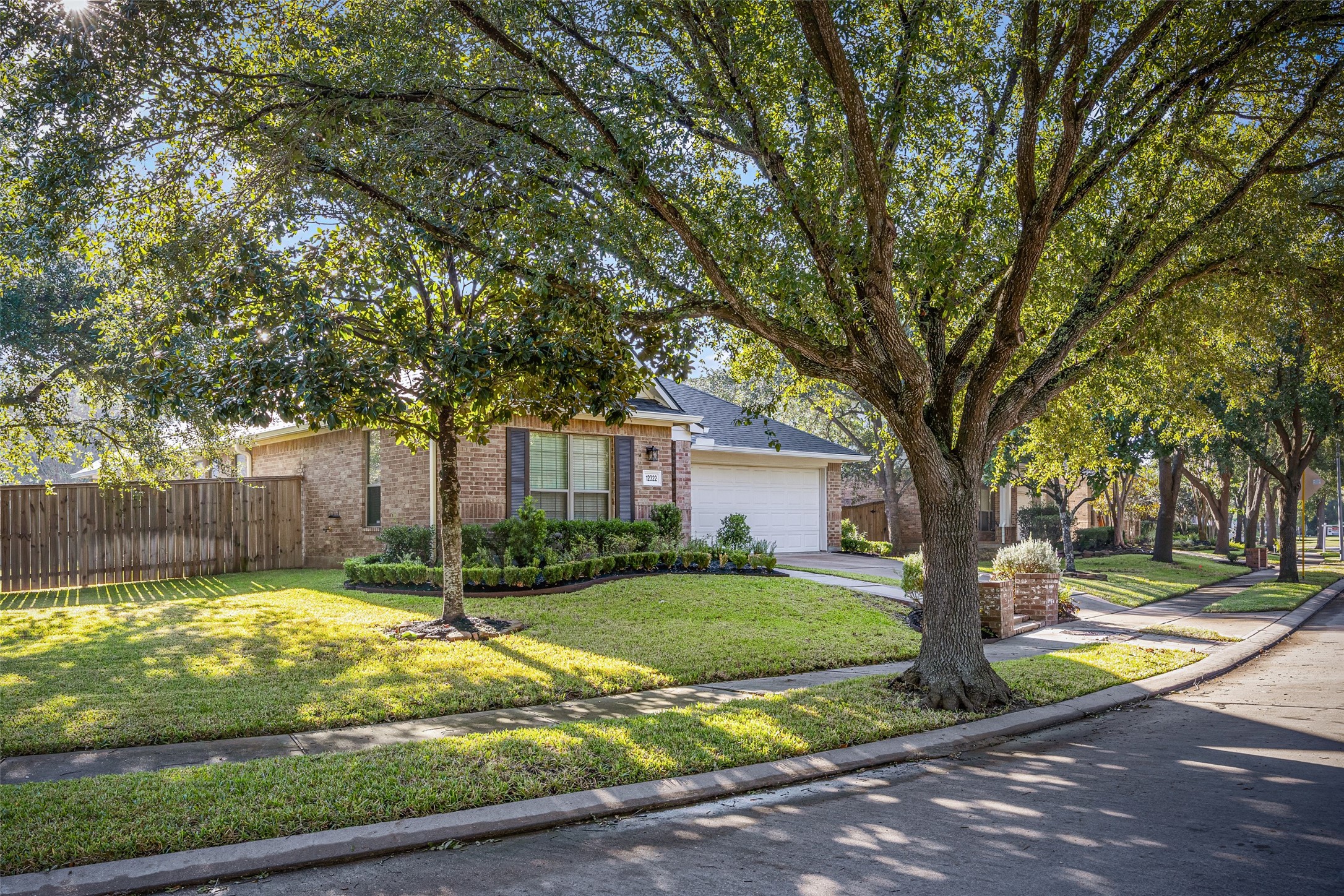 12322 West Elizabeth Shore Loop Cypress, TX 77433 - Photo 4 of 28 a view of a trees in front of a house