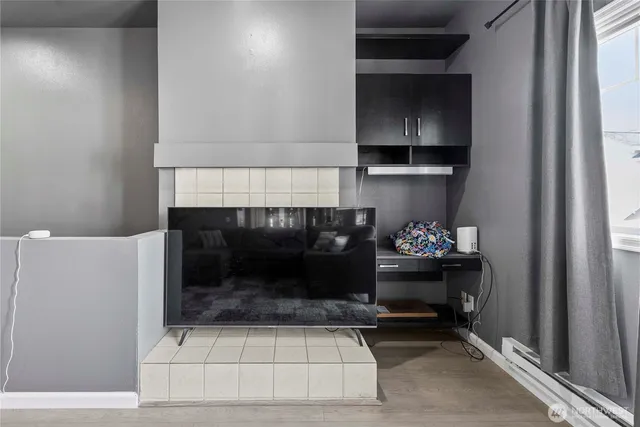 a living room with a fireplace