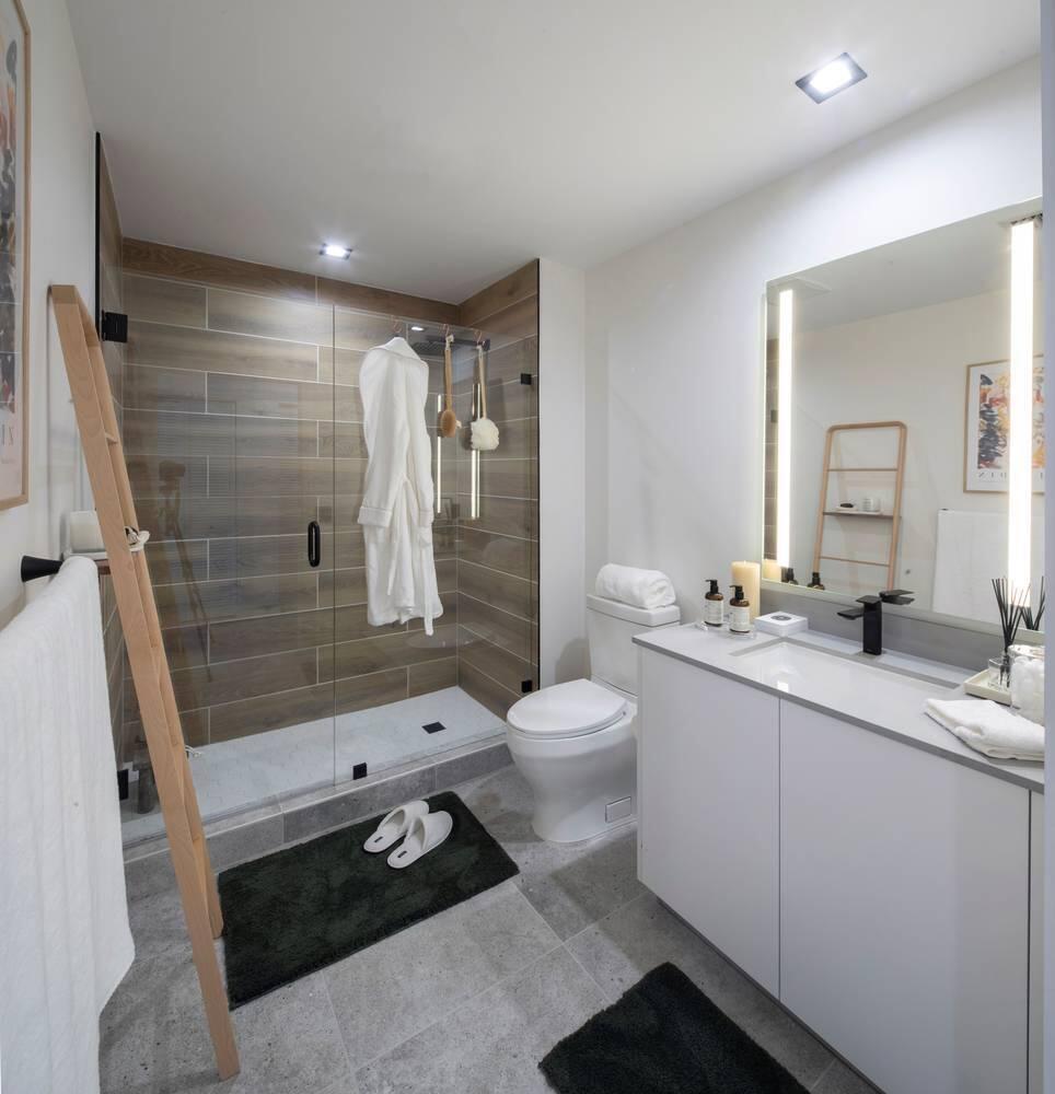 2150 North Miami Avenue, Unit W1120 Miami, FL 33127 - Photo 11 of 27 a bathroom with a sink a toilet and shower