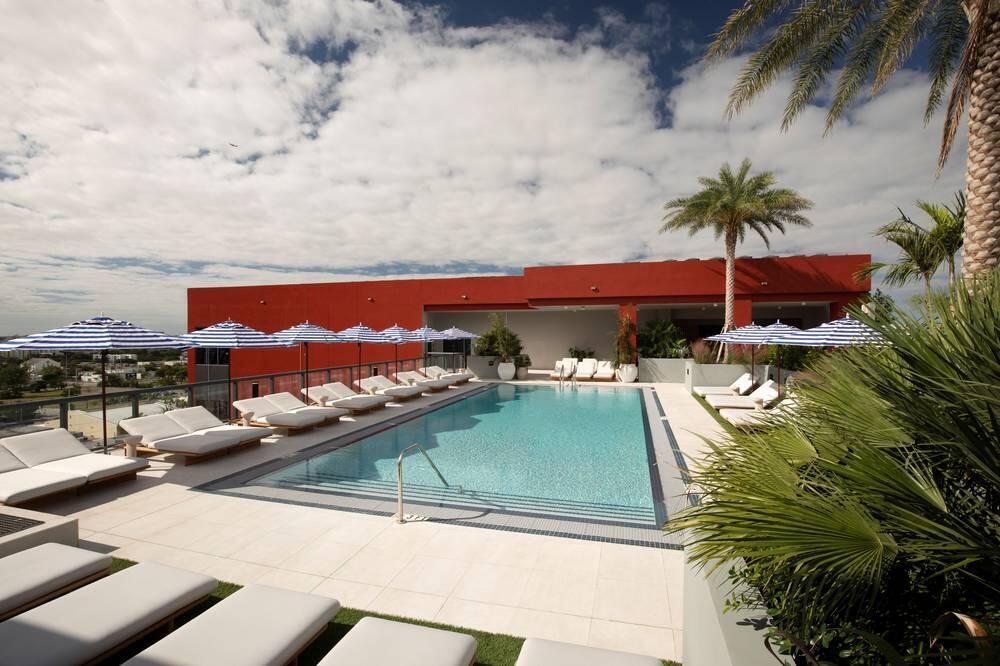 2150 North Miami Avenue, Unit W1120 Miami, FL 33127 - Photo 13 of 27 a view of swimming pool with a table and chairs