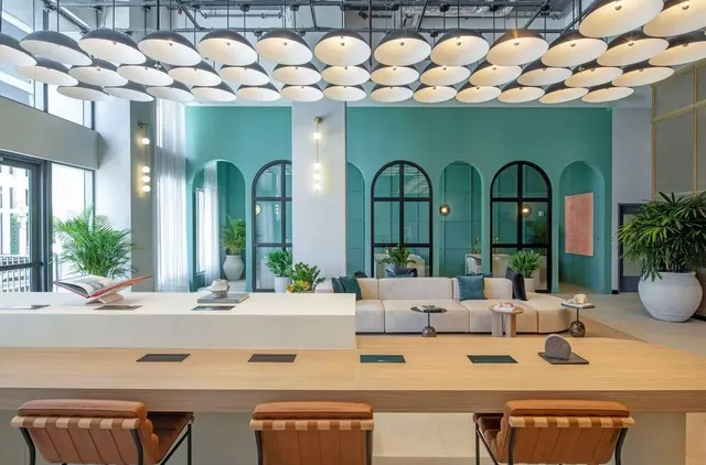 a view of swimming pool with outdoor seating