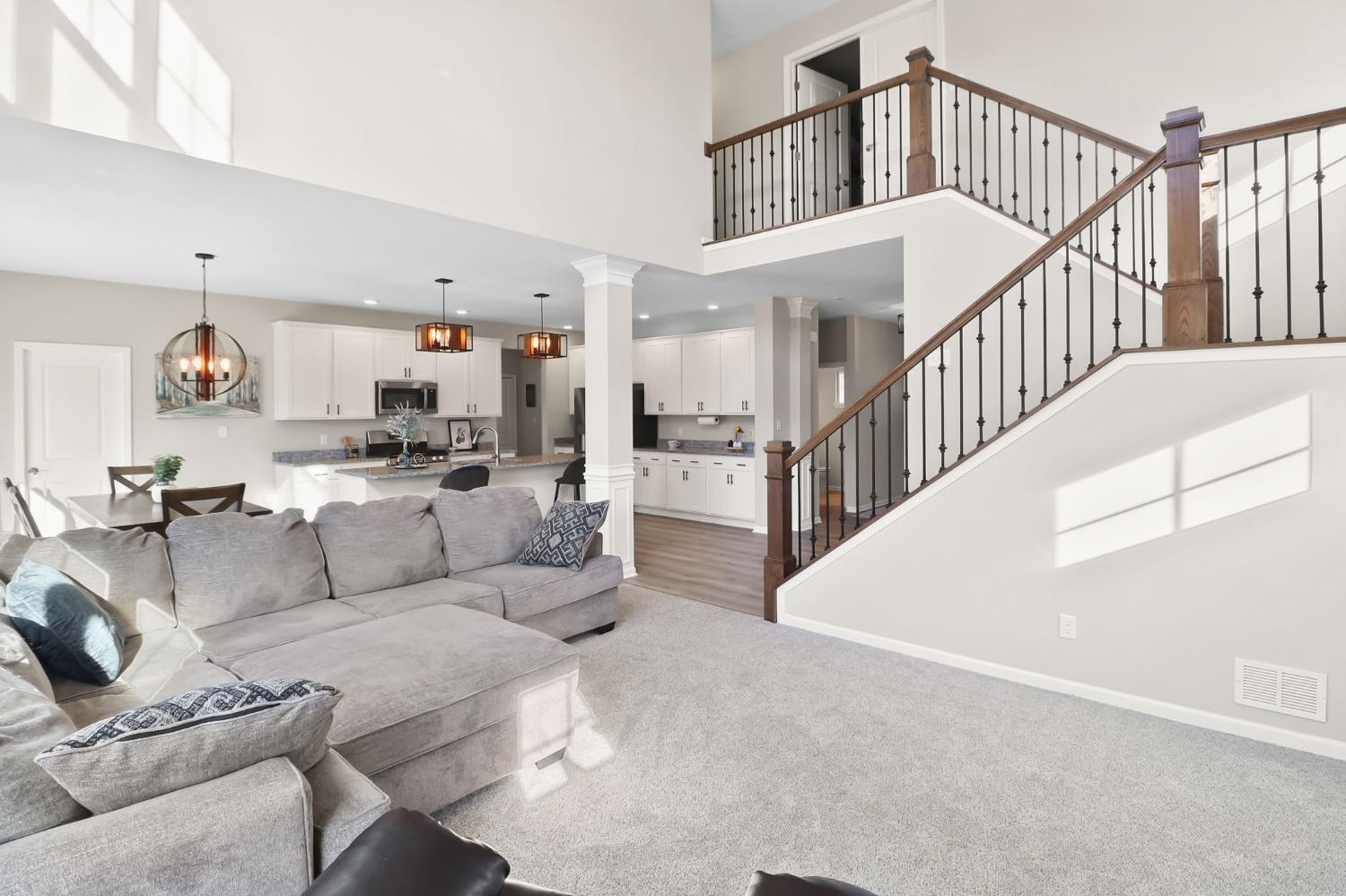 2592 Ritter Street Chesterton, IN 46304 - Photo 11 of 25 a living room with furniture and a chandelier