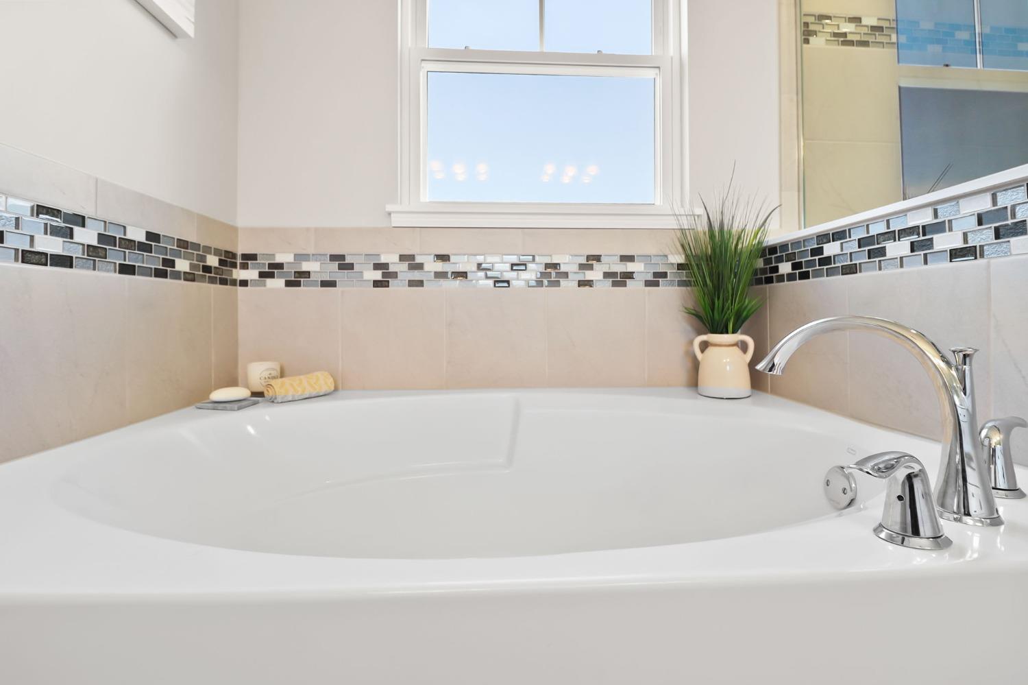 2592 Ritter Street Chesterton, IN 46304 - Photo 15 of 25 a white bath tub sitting in a bathroom