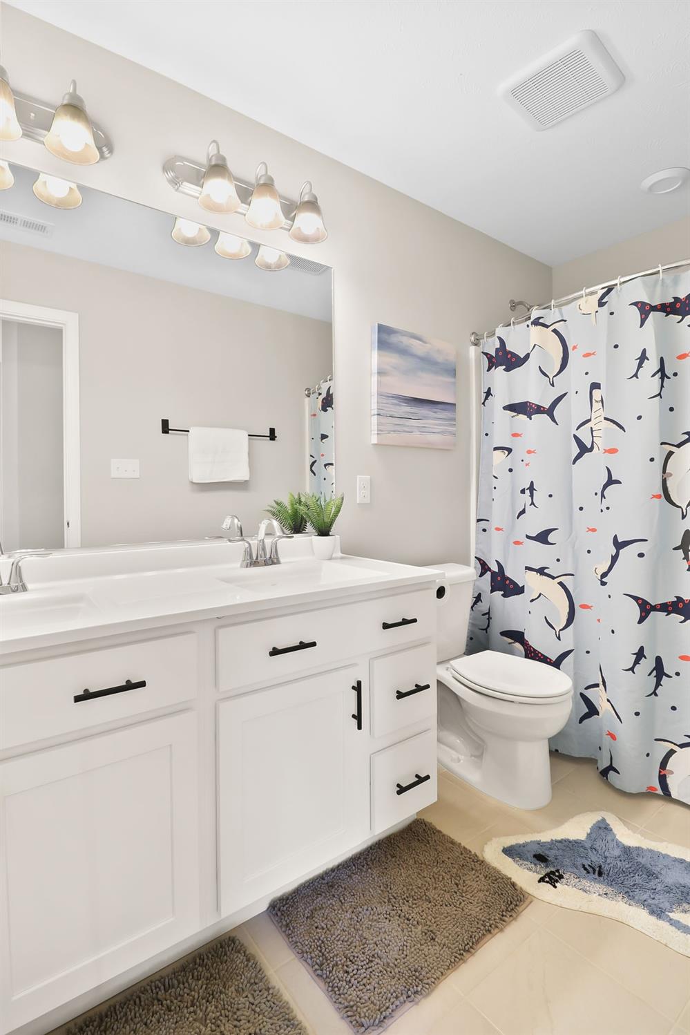 2592 Ritter Street Chesterton, IN 46304 - Photo 23 of 25 a bathroom with a sink toilet and shower