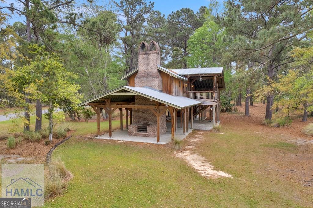 Lot 29 Jerico Marsh Road Midway, GA 31320 - Photo 12 of 14 a view of a house with a yard