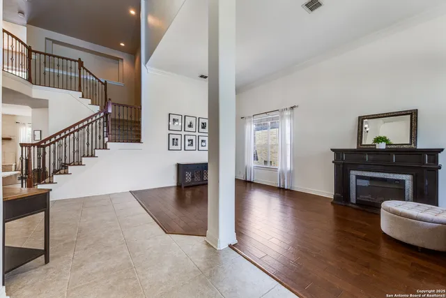 a view of an entryway with wooden floor