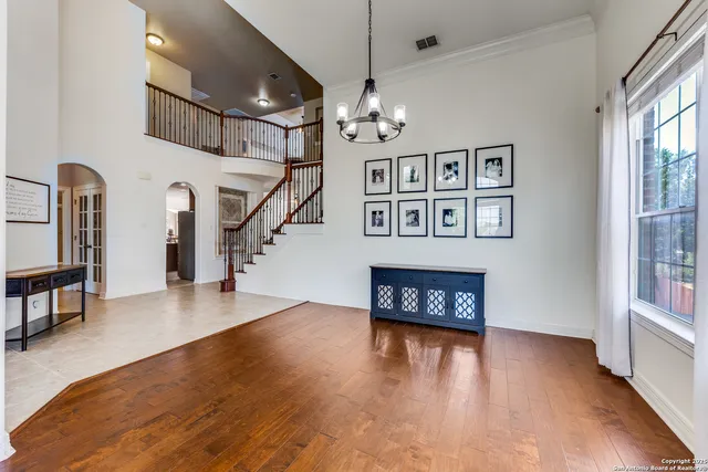 a view of an entryway with wooden floor