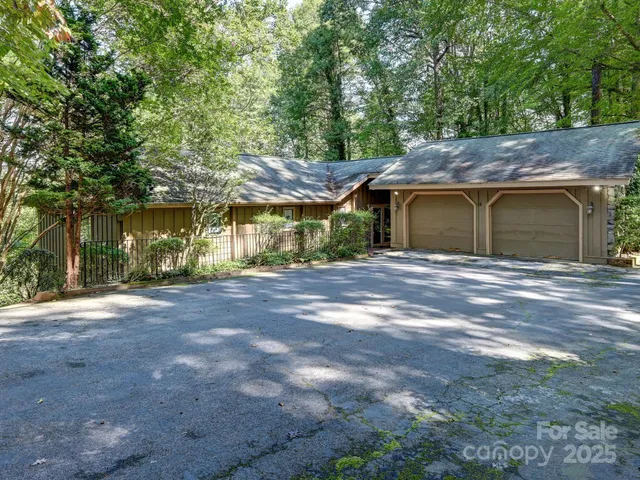 a view of a house with a tree