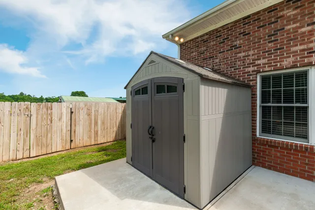 a view of backyard with green space