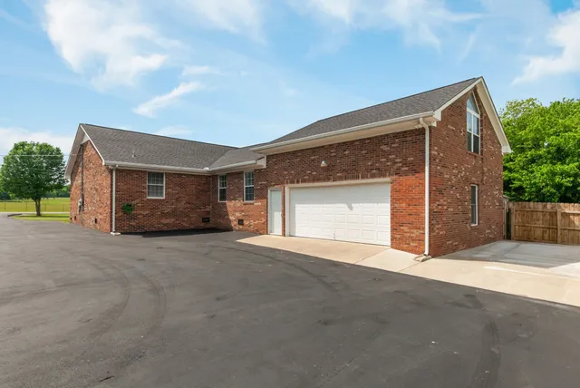 a view of a house with a garage