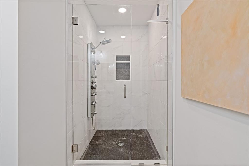 2226 Alpha Drive Decatur, GA 30032 - Photo 18 of 36 a bathroom with a sink and a shower