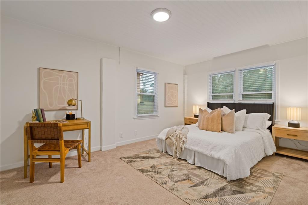 2226 Alpha Drive Decatur, GA 30032 - Photo 23 of 36 a bedroom with a bed and a window
