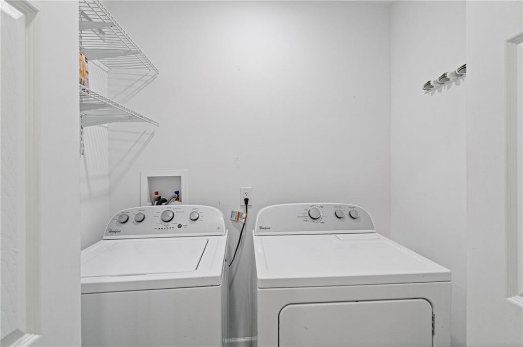 2226 Alpha Drive Decatur, GA 30032 - Photo 25 of 36 a utility room with dryer and washer