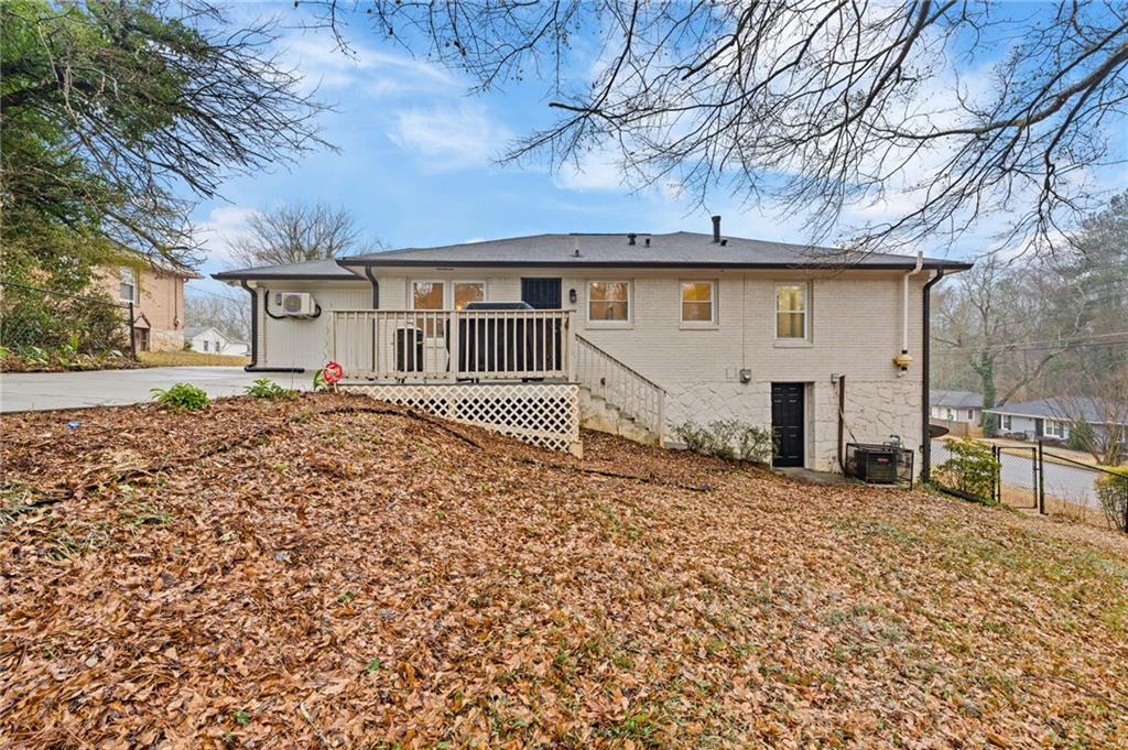 2226 Alpha Drive Decatur, GA 30032 - Photo 30 of 36 a front view of a house with a yard